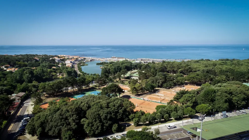 Aerial view of the sports complex near the ocean.